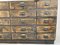 Mueble industrial vintage de madera con etiquetas originales de latón, años 30, Imagen 8