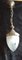 Antike Corridor Deckenlampe mit geschliffenem, tropfenförmigem Glasschirm auf oraler Messinghalterung, 1920er 1