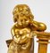 Antiker Putto aus vergoldeter Bronze 8