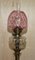 Viktorianische Öllampe aus Rubinglas mit spiralförmigem korinthischem Säulenfuß 2