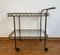 Art Deco Two-Tier Glass & Golden Metal Bar Cart on Rubber-Tired Wheels, Image 1