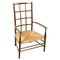 Arts & Crafts Lattice Back Low Armchair with Rush Seat from Liberty & Co, Image 1