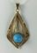Pendant in Gold with Turquoise Blue Stone 1