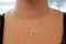 Collana con ciondolo croce stilizzata in oro rosa e bianco, 18 carati, Immagine 4
