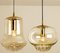 Lámparas colgantes de vidrio ahumado marrón y latón de Peill & Putzler, años 60. Juego de 2, Imagen 12