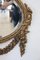 Oval Wall Mirror in Carved and Gilded Wood, 1930s 8