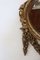 Oval Wall Mirror in Carved and Gilded Wood, 1930s 4