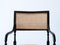 Ebonisierter Carver Armlehnstuhl mit Sitz aus Rohrgeflecht 4