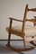 Oak Rocking Chair Reupholstered in Lambswool by Henning Kjærnulf, 1960s 18