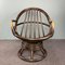 Vintage Manou Rattan Swivel Chair, 1970s 6