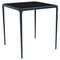 70 Xaloc Navy Glass Top Table from Mowee 1