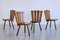 Französische moderne dreibeinige Esszimmerstühle aus Eiche mit fächerförmiger Rückenlehne, 1950er, 4er Set 1