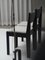 01 Stuhl aus schwarzem Eschenholz mit weißem Bouclé Bezug und Details aus Bronze von barh.design 13