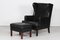 Danish Modern Wing Chair and Stool with Black Leather in Kaare Klint Style, 1970s, Set of 2 1