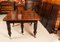 19th Century Flame Mahogany Extending Dining Table and Chairs, Set of 11 9