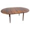 Red Exotic Wood Round Dining Extending Table from Elsteds Mobelfabrik, Denmark, 1960s, Image 1