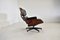 Lounge Chair in Black Leather and Rosewood by Charles & Ray Eames for Herman Miller, 1970s, Image 7