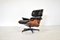 Lounge Chair in Black Leather and Rosewood by Charles & Ray Eames for Herman Miller, 1970s, Image 6