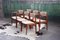 Mesa de comedor y sillas danesas vintage de teca, años 70. Juego de 7, Imagen 3