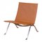 Poltrona PK-22 in pelle color cognac di Poul Kjærholm per Fritz Hansen, Immagine 1