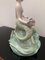 Bicauda Meerjungfrau mit Muschel auf Felsen und mythologischen Fischen 8