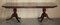 Flamed Mahogany & Walnut Based Tripod Extending Dining Table with Brass Castors 3
