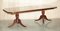 Flamed Mahogany & Walnut Based Tripod Extending Dining Table with Brass Castors 2