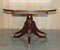 Flamed Mahogany & Walnut Based Tripod Extending Dining Table with Brass Castors 20