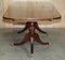 Flamed Mahogany & Walnut Based Tripod Extending Dining Table with Brass Castors, Image 15