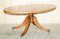 Tavolino da caffè vintage ovale in legno di tasso con ruote di Bevan Funnell, Immagine 1