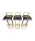 Stools in Gilt Metal with Black Leather Seat Pads in the style of Maison Jansen, 1970s, Set of 3 3