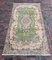 Vintage Usak Rug in Green and Pink 1