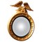 Italian Regency Round Giltwood and Ebonized Convex Mirror with Carved Eagle 1
