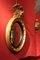 Italian Regency Round Giltwood and Ebonized Convex Mirror with Carved Eagle 5