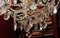 Italienischer Kronleuchter aus geschliffenem Kristallglas mit Perlen aus vergoldetem Eisen, 19. Jh 19