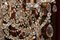 Italienischer Kronleuchter aus geschliffenem Kristallglas mit Perlen aus vergoldetem Eisen, 19. Jh 14