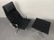 Aluminum EA 124 Rotating Armchair with Ea 125 Footstool by Charles & Ray Eames for Herman Miller from Vitra, Germany, 1970s, Set of 2 2