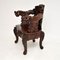 Antiker chinesischer Armlehnstuhl aus geschnitztem Hartholz, 1890er 6