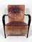 Mid-Century Italian Sculptural Leather and Curved Wood Armchair, 1950s 1