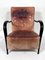 Mid-Century Italian Sculptural Leather and Curved Wood Armchair, 1950s, Image 1