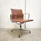 Cognac Leather & Aluminum EA107 Office Chairs by Charles & Ray Eames for Vitra, 1990s, Set of 8 3