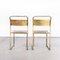 Röhrenförmige Esszimmerstühle aus goldenem Metall, 1950er, 2er Set 3