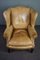 Vintage Armlehnstuhl aus Leder & Holz 6