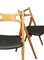 Modell Ch 29 Sawbuck Stuhl aus Eiche & schwarzem Leder von Hans J. Wegner für Carl Hansen & Søn, 1960er 2