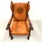 French Wing Chair in Cognac Leather with Carvings, 1920s 2