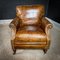 Vintage English Leather Armchair with Brass Wheels, Image 1