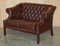 Chesterfield Tufted Sofas in Bordeaux Brown Leather from Harrods London, Set of 2 18