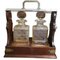 20th Century Cut Glass Decantars and Stoppers on Wood Metal and Brass Framed Tantalus, Set of 3 8