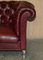 Large Vintage Chesterfield Sofa in Oxblood Leather from Howard & Sons, Image 11