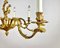 Lámpara de araña de bronce con figura de querubín para 8 puntos de luz, Francia, años 50, Imagen 4
